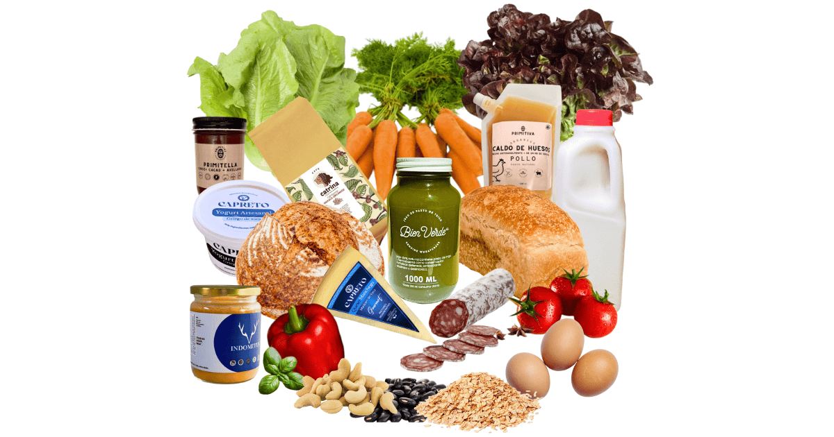 Productos frescos y artesanales de La Comuna: verduras, pan de masa madre, lácteos, caldos, kombucha, charcutería y huevos de granja.